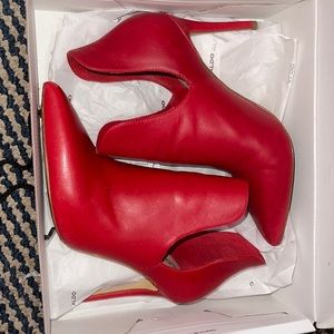 ALDO red heels, worn twice, light crease. Best for parties and going out